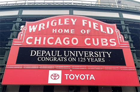 Wrigley Field marquee displaying DePaul University's 125th anniversary'